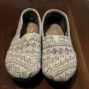 TOMS Black and Cream Patterned Slip-Ons